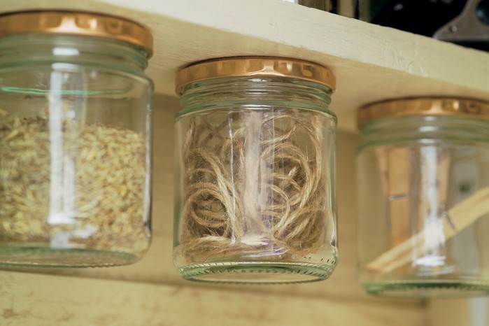 Using jam jars for extra storage. Paul Debois