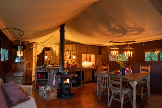 Glamping tent interior, Warren Farm Somerset. Photo: Featherdown
